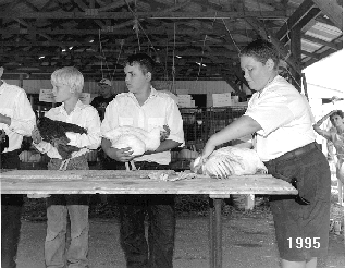 Boys displaying their poultry