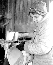 Renate Miller feeding cows