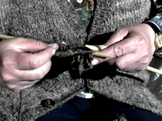 Woman knitting a sweater